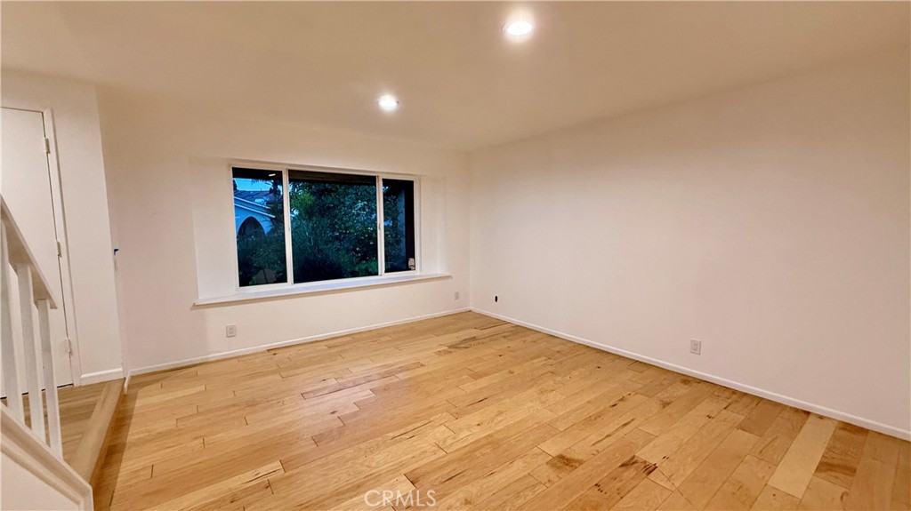 13434 Randsburg Street Cerritos, CA 90703 - Photo 3 of 13 a view of an empty room with a window