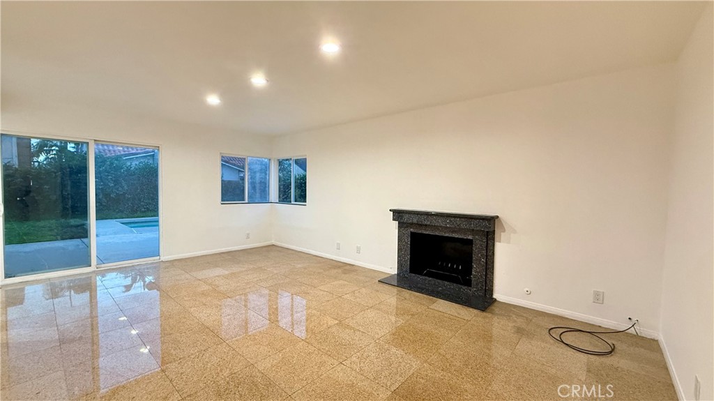13434 Randsburg Street Cerritos, CA 90703 - Photo 6 of 13 a view of an empty room with glass door