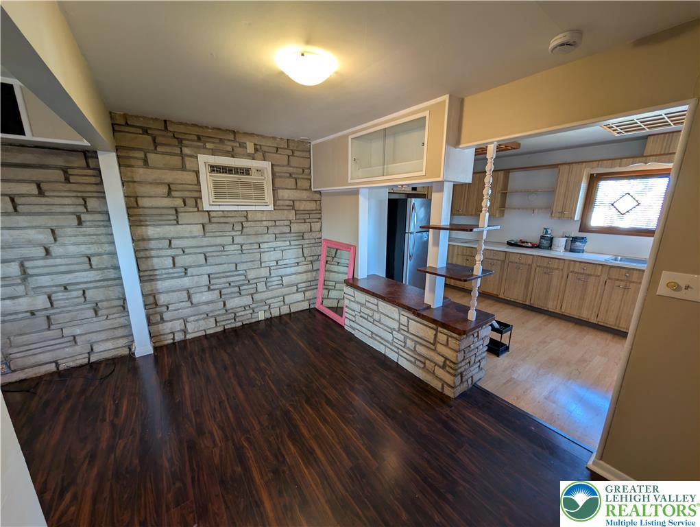 950 South 25th Street, Unit 1 Easton, PA 18042 - Photo 4 of 16 a living room with furniture and a wooden floor