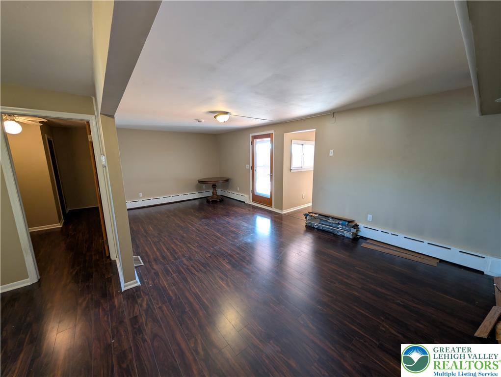 950 South 25th Street, Unit 1 Easton, PA 18042 - Photo 6 of 16 an empty room with wooden floor and windows