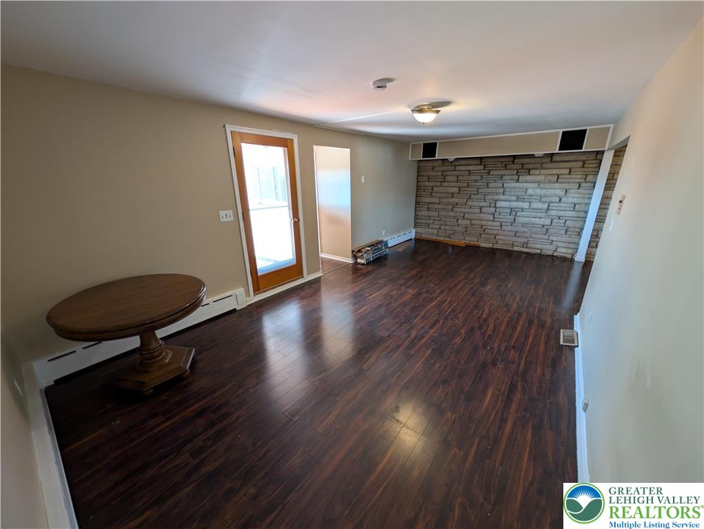 950 South 25th Street, Unit 1 Easton, PA 18042 - Photo 7 of 16 a view of an empty room with a window and wooden floor
