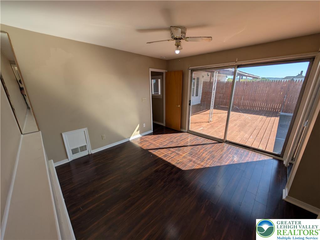 950 South 25th Street, Unit 1 Easton, PA 18042 - Photo 10 of 16 a view of an empty room with wooden floor and windows