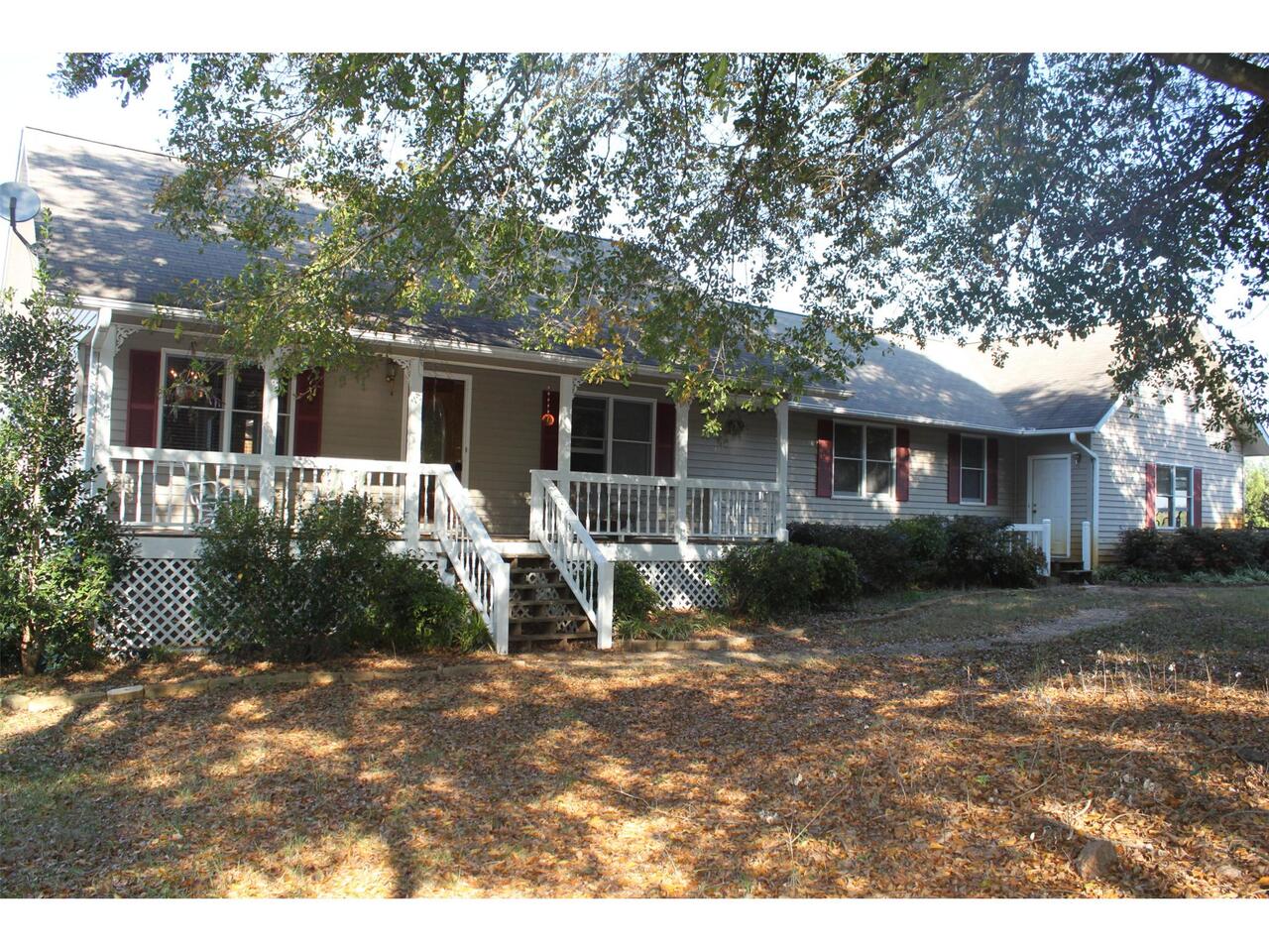 1773 Wildcat Bridge Road Royston, GA 30662 - Photo 1 of 1 a view of a house with a yard