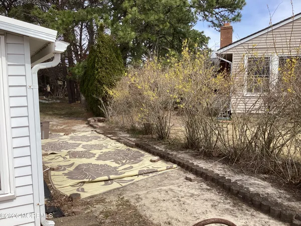 a view of a backyard of a house