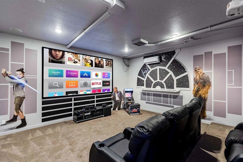 717 Desert Mountain Court Reunion, FL 34747 - Photo 11 of 62 a living room with furniture and a flat screen tv