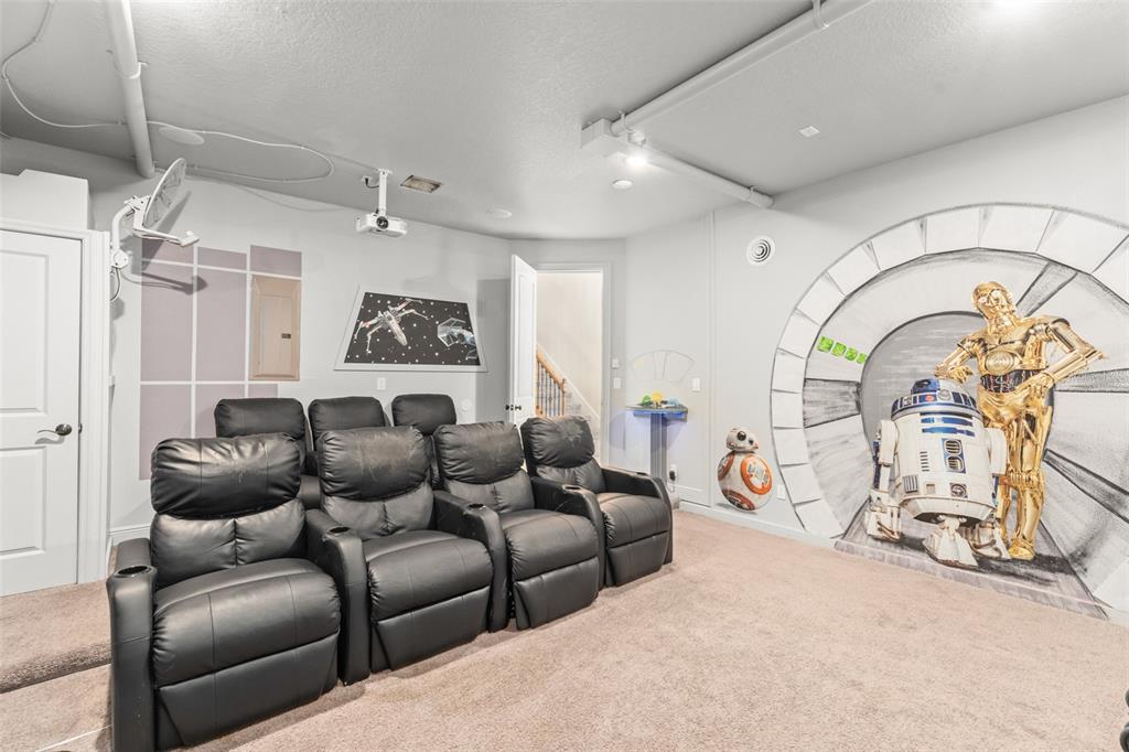 717 Desert Mountain Court Reunion, FL 34747 - Photo 14 of 62 a living room with furniture a chandelier