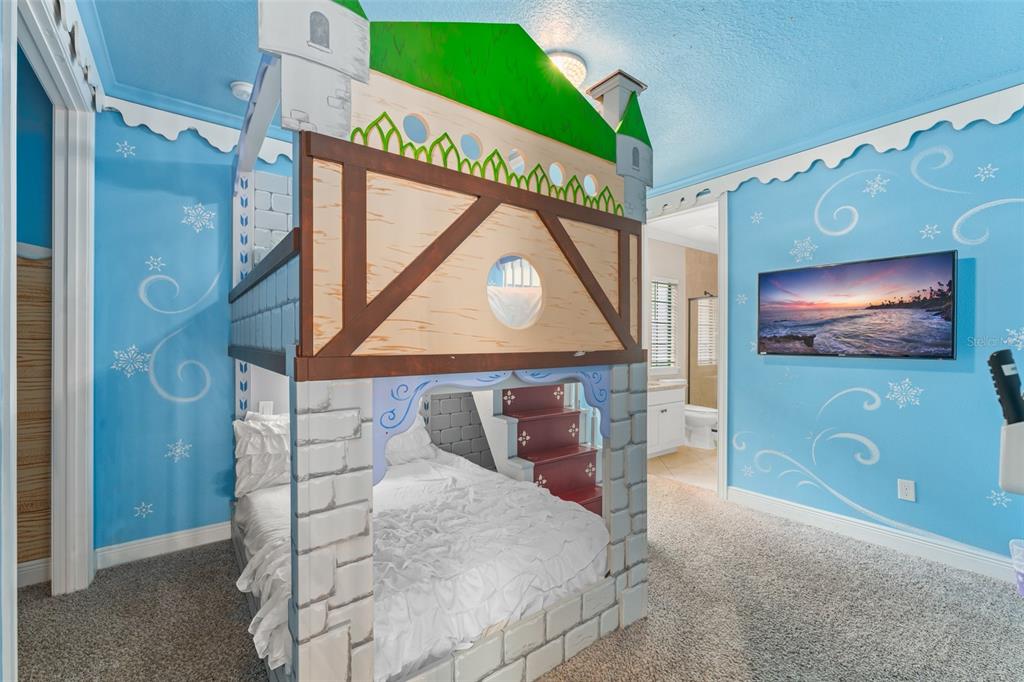 717 Desert Mountain Court Reunion, FL 34747 - Photo 32 of 62 a view of a bedroom