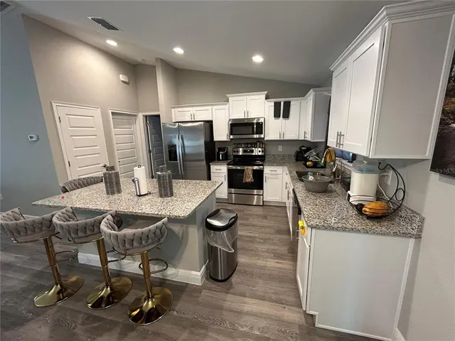 a view of a dining room with furniture