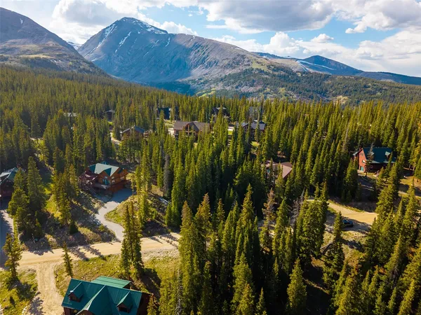 a view of a lot of trees and houses