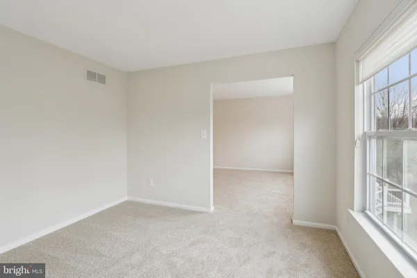 a view of small space with racks on the wall