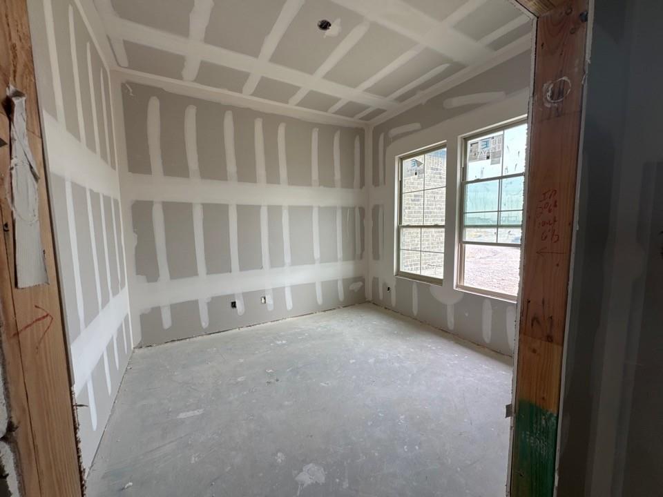 197 Brandywine Trail Rhome, TX 76078 - Photo 3 of 14 a view of an empty room with a window