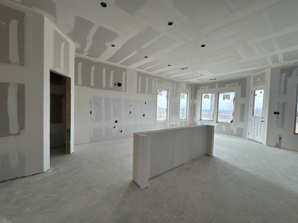 197 Brandywine Trail Rhome, TX 76078 - Photo 5 of 14 a large hall with an entryway and chandelier