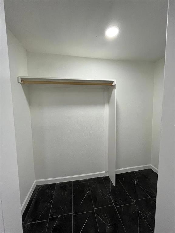 2851 Casey Street Dallas, TX 75215 - Photo 13 of 22 an empty room with wooden floor