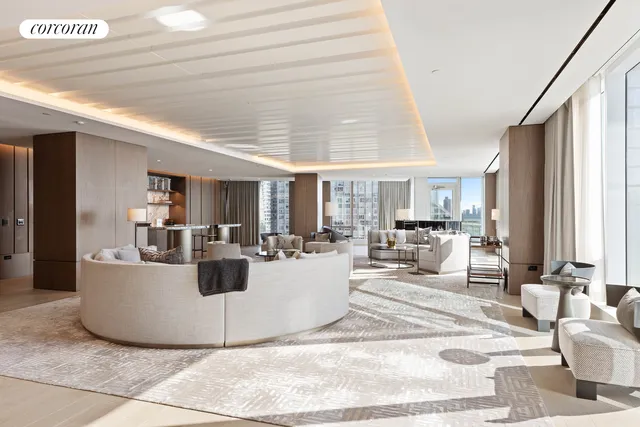 a view of a patio with couches and potted plants