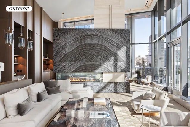 a dining hall with stainless steel appliances a dining table and chairs