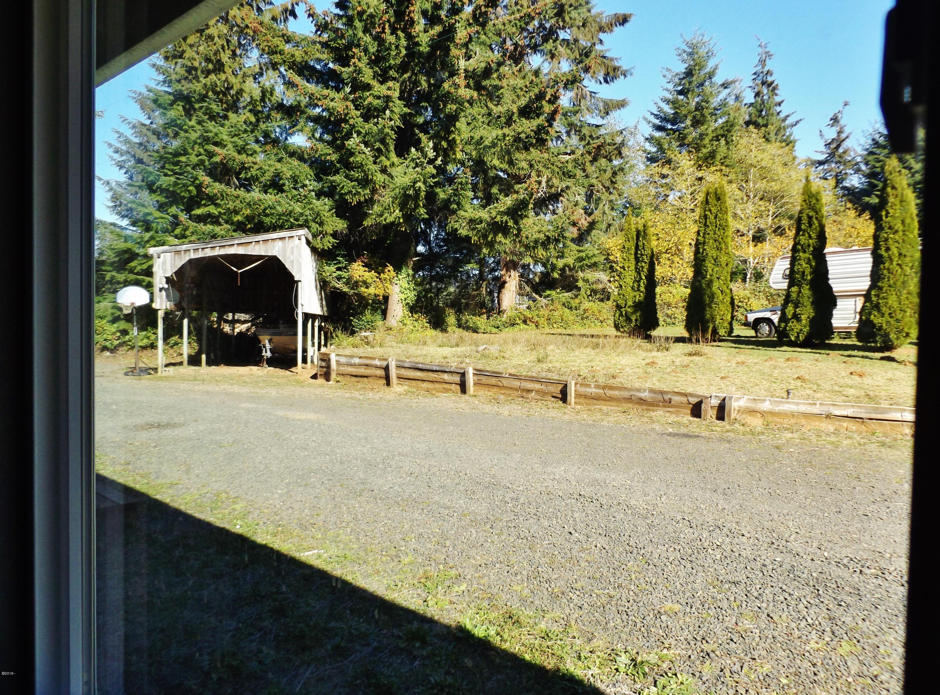 353 East Darkey Creek Road Waldport, OR 97394 - Photo 27 of 35 View to Rear of House