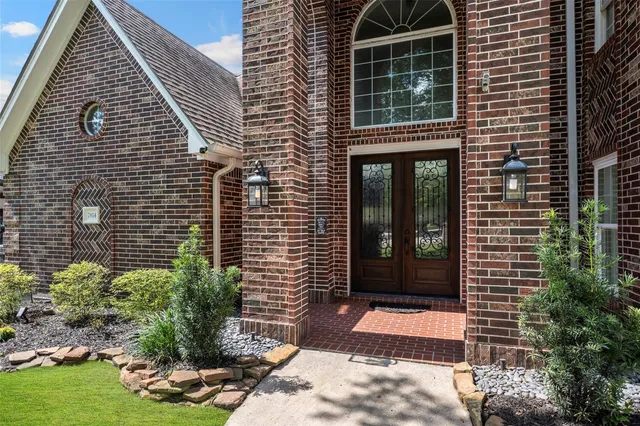 a view of entrance of the house and plants