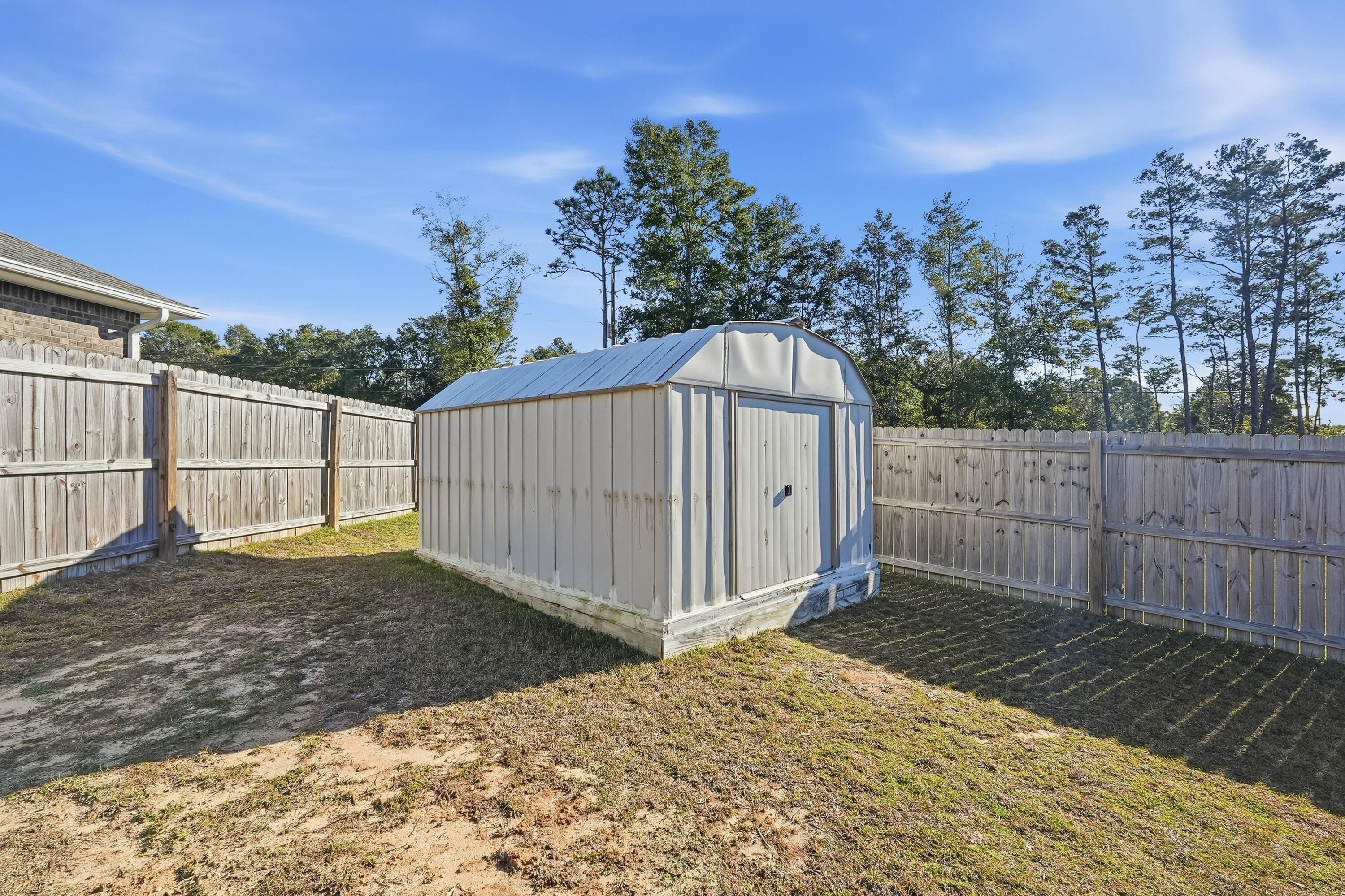 7434 Gordon Evans Road Navarre, FL 32566 - Photo 49 of 51 a view of a backyard