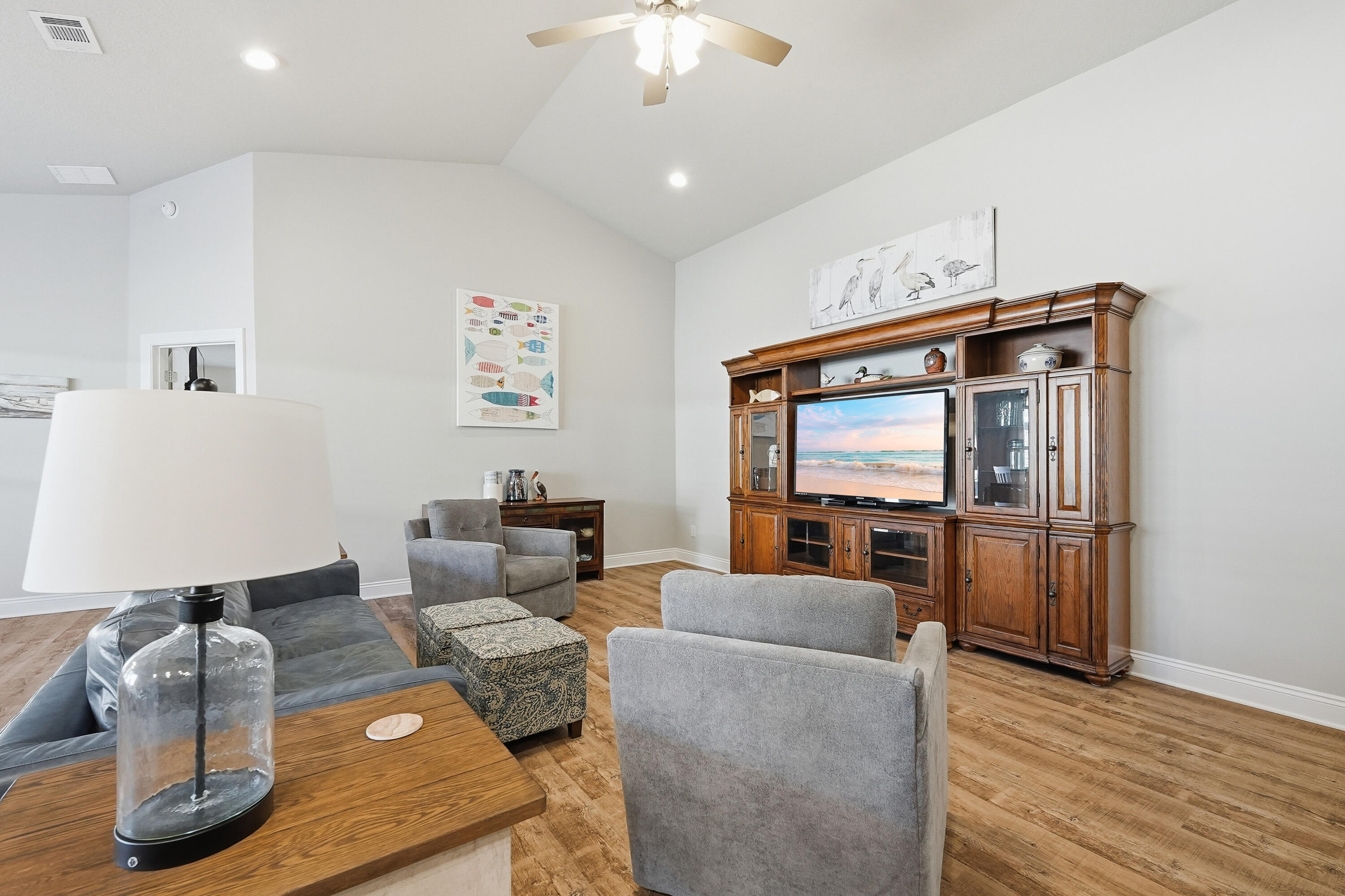 7434 Gordon Evans Road Navarre, FL 32566 - Photo 5 of 51 a living room with furniture and a flat screen tv