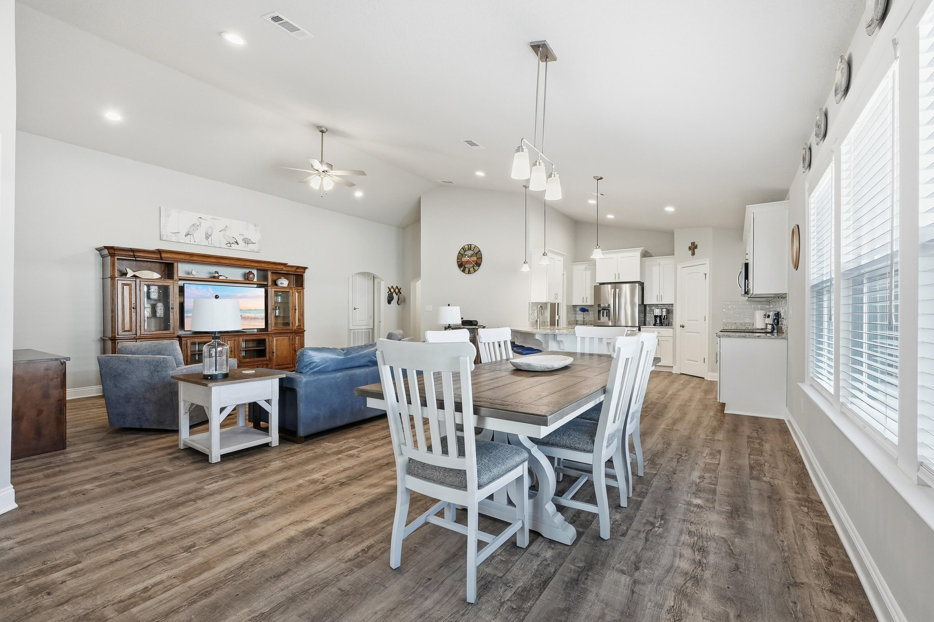 7434 Gordon Evans Road Navarre, FL 32566 - Photo 9 of 51 a view of a dining room with furniture window and wooden floor
