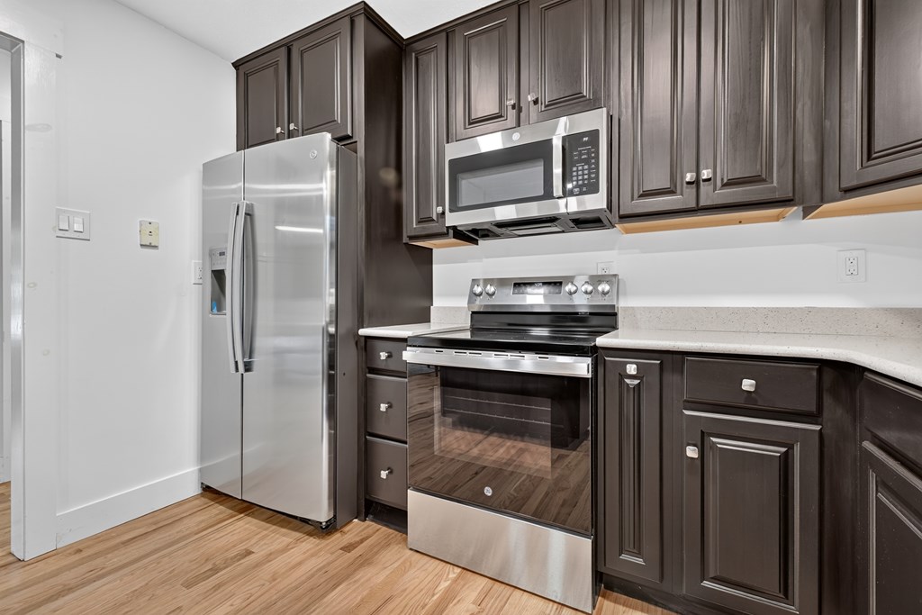 975 Goss Road Epworth, GA 30541 - Photo 49 of 58 a kitchen with a refrigerator stove and microwave