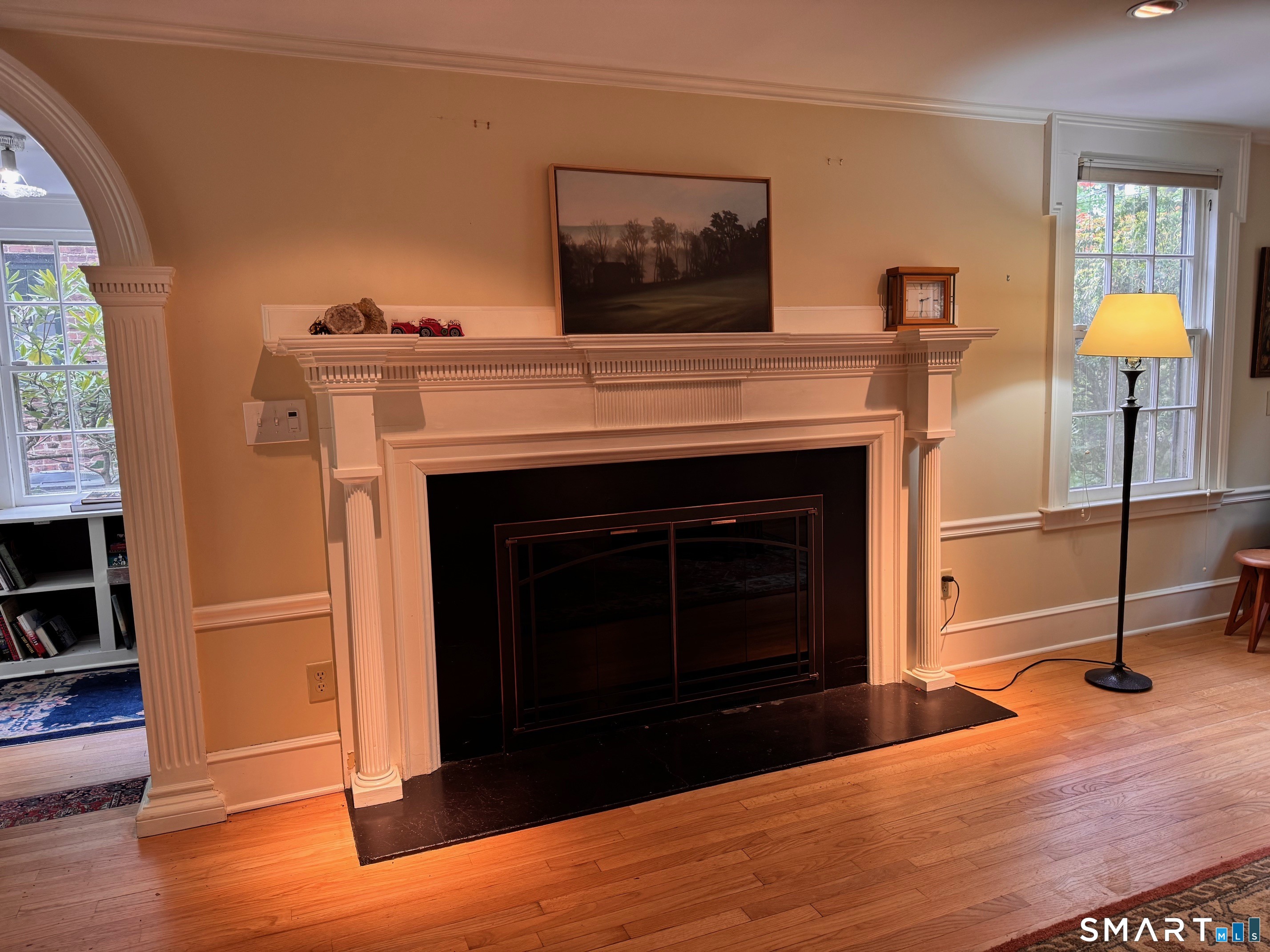 57 Mill Rock Road Hamden, CT 06517 - Photo 6 of 24 a living room with furniture and a fireplace