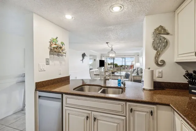 a kitchen with appliances and cabinets