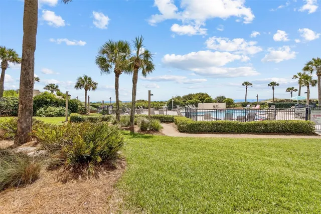 a view of building with yard