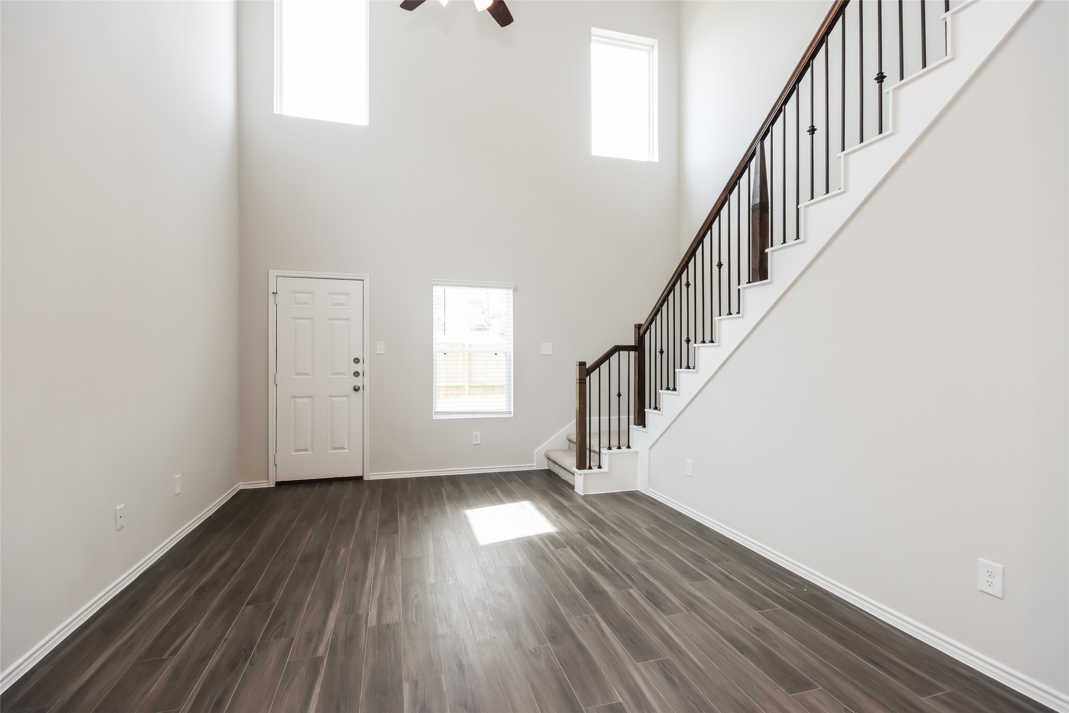 15264 Estrella Road East Houston, TX 77073 - Photo 7 of 14 a view of an entryway with wooden floor