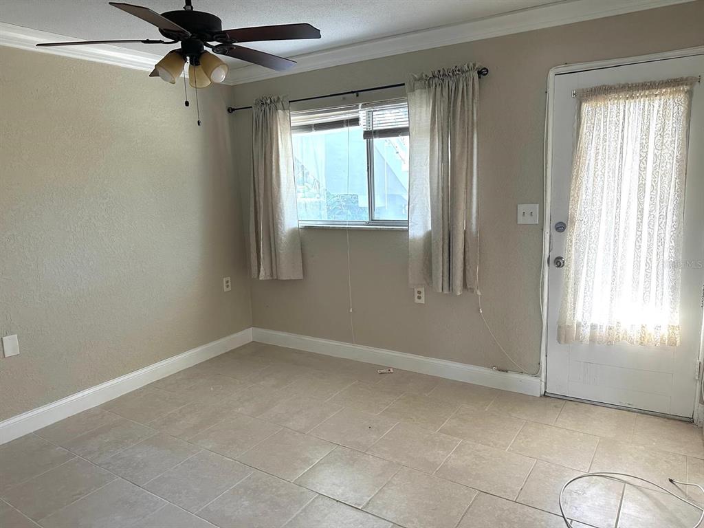 8450 112th Street North, Unit 102 Seminole, FL 33772 - Photo 34 of 80 a view of an empty room and window