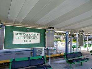 8450 112th Street North, Unit 102 Seminole, FL 33772 - Photo 58 of 80 a outdoor space with furniture