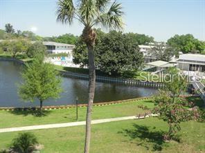 8450 112th Street North, Unit 102 Seminole, FL 33772 - Photo 68 of 80 a view of a lake in a city