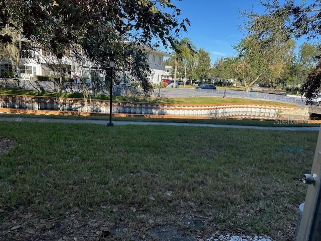 8450 112th Street North, Unit 102 Seminole, FL 33772 - Photo 70 of 80 a view of a park with large trees