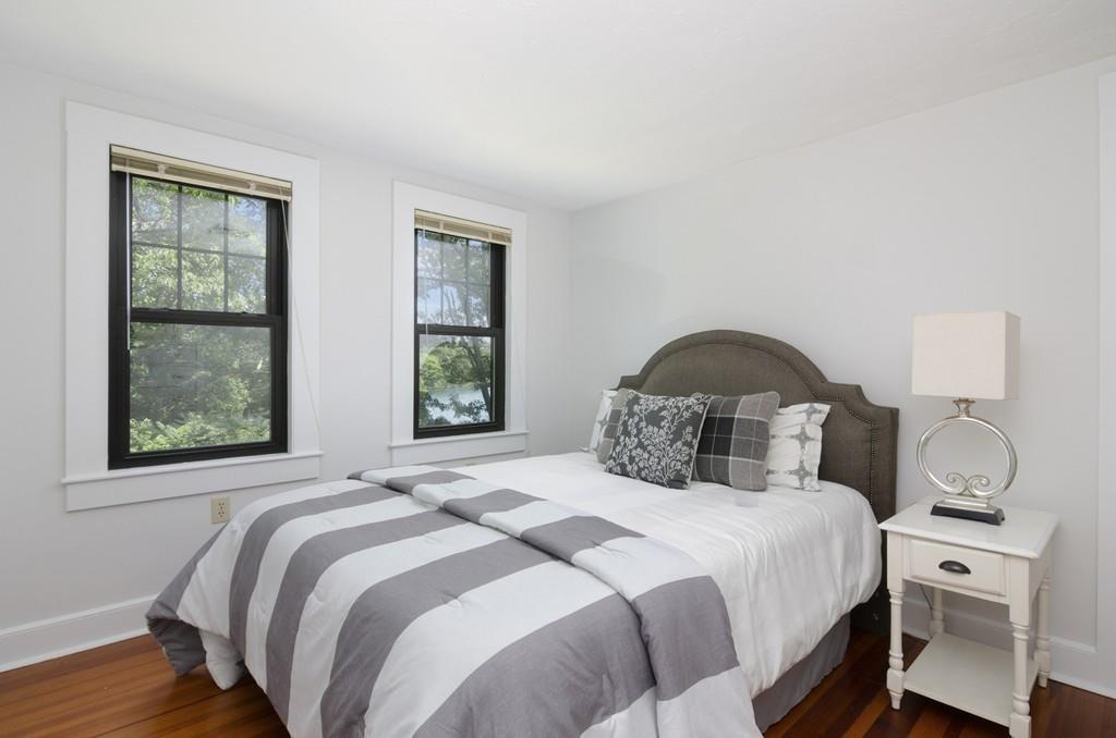 34 Stowe Road Sandwich, MA 02563 - Photo 16 of 19 a bedroom with a bed and a window