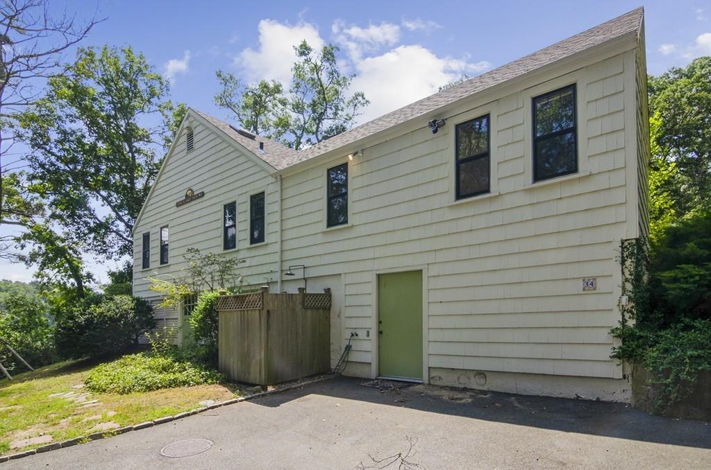 34 Stowe Road Sandwich, MA 02563 - Photo 18 of 19 a view of a small house with a tree