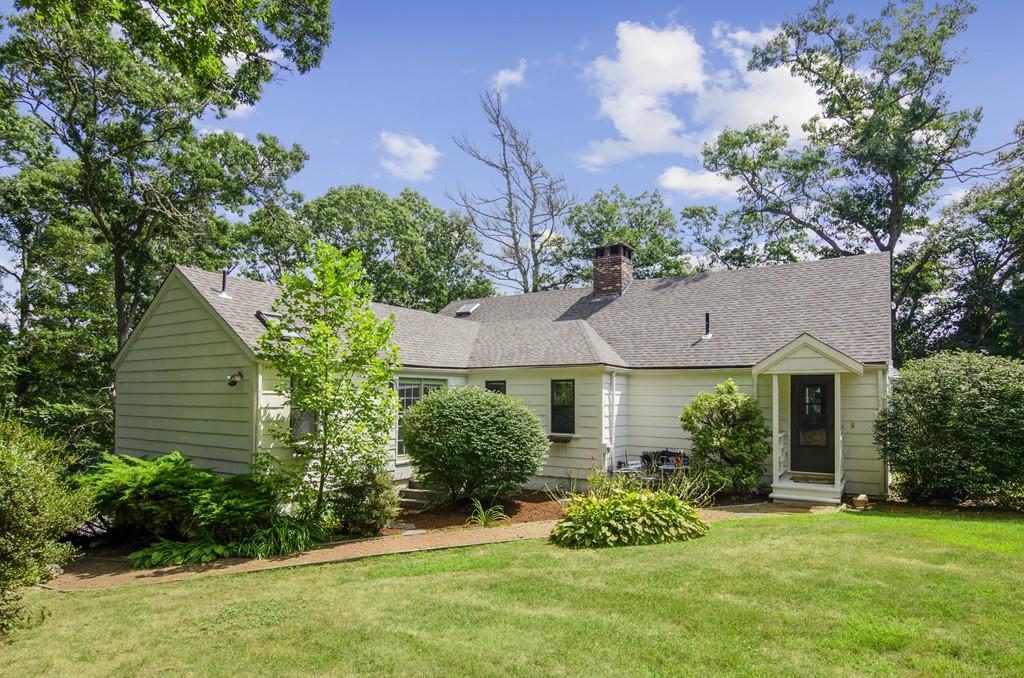 34 Stowe Road Sandwich, MA 02563 - Photo 2 of 19 a front view of a house with a yard