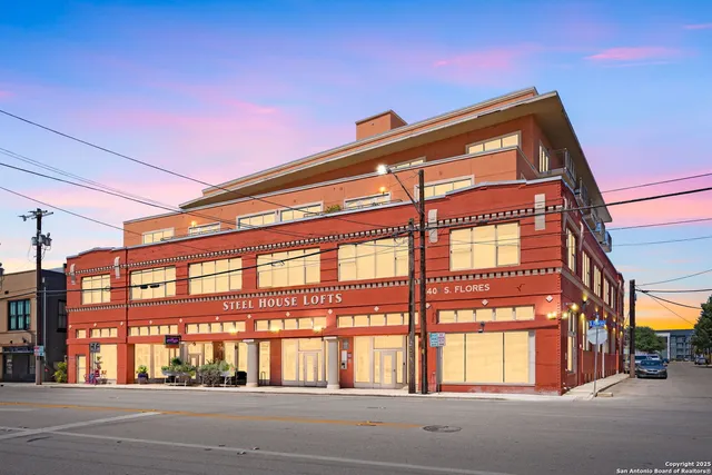 a front view of building with a street