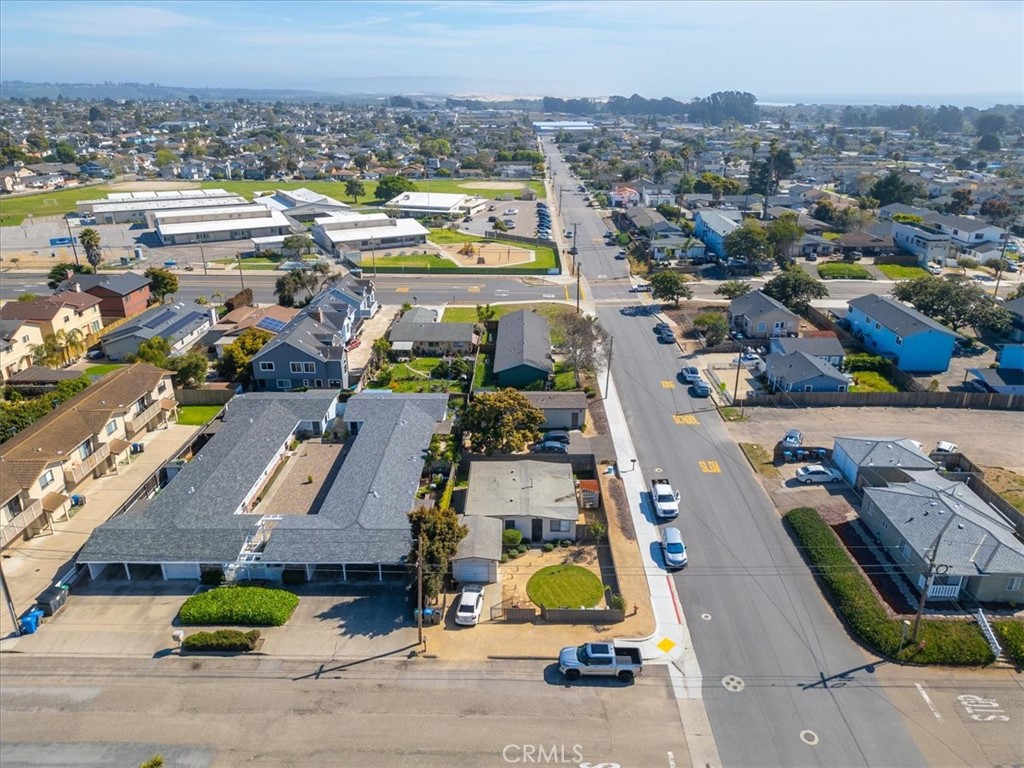241 South 10th Street Grover Beach, CA 93433 - Photo 19 of 21 an aerial view of residential houses with outdoor space