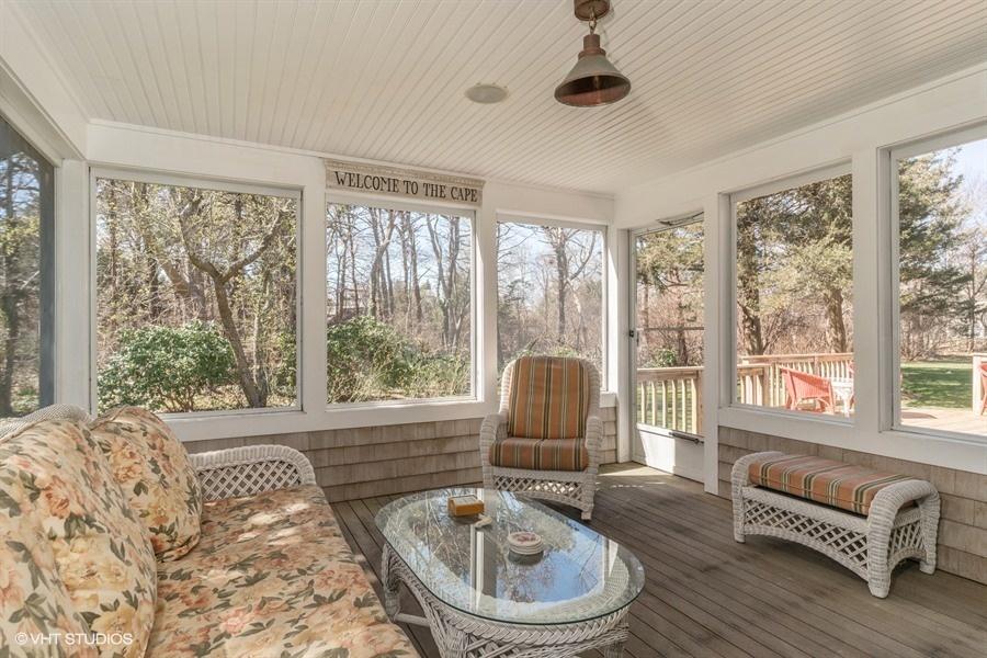 107 Pochet Road Orleans, MA 02653 - Photo 8 of 19 a living room with furniture and a window