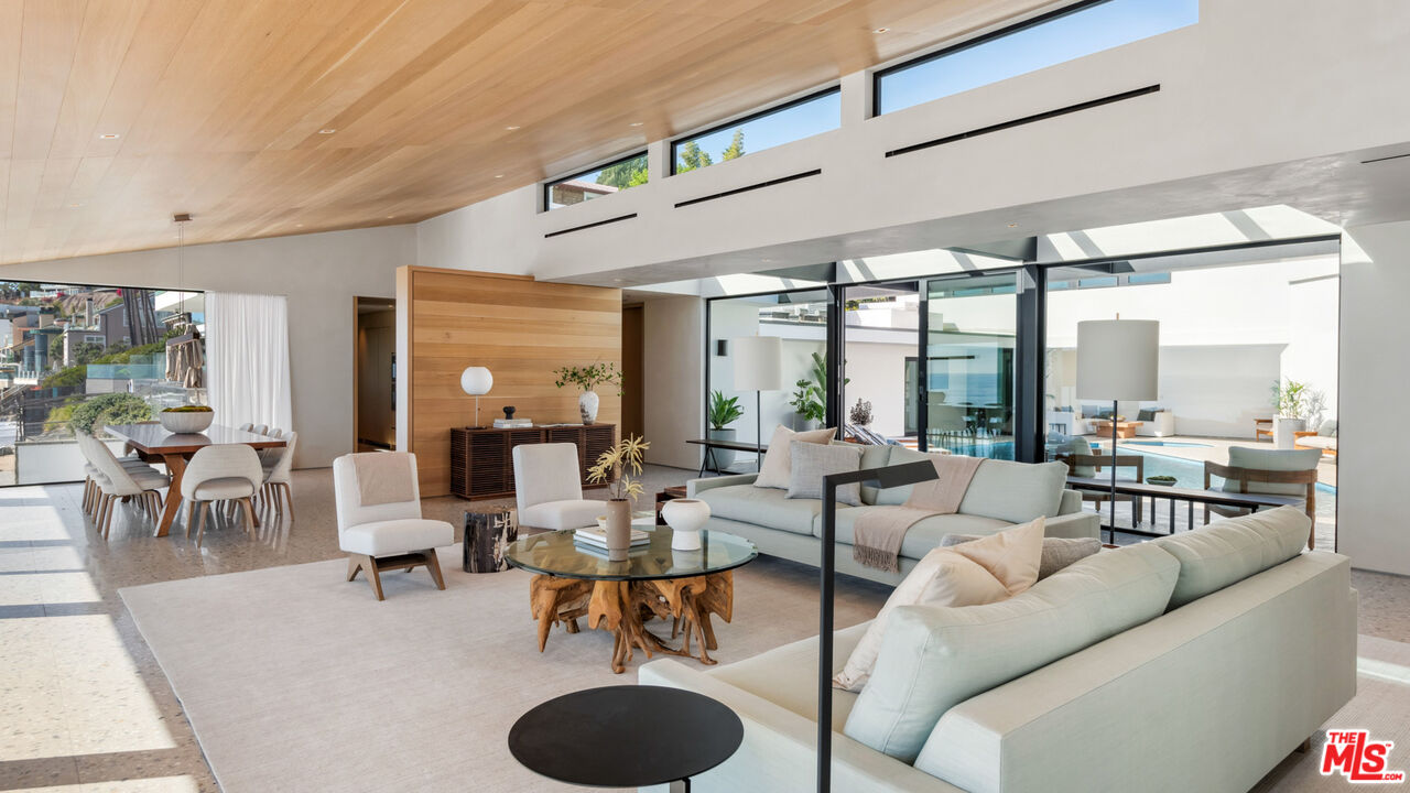 31388 Broad Beach Road Malibu, CA 90265 - Photo 22 of 74 a living room with furniture and a large window