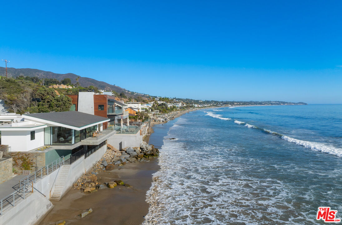 31388 Broad Beach Road Malibu, CA 90265 - Photo 3 of 74 a view of a ocean with a building in the background