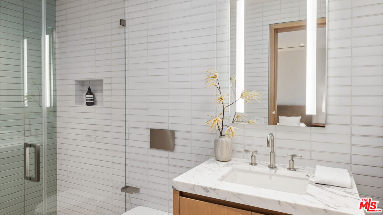 31388 Broad Beach Road Malibu, CA 90265 - Photo 55 of 74 a bathroom with a sink and a mirror