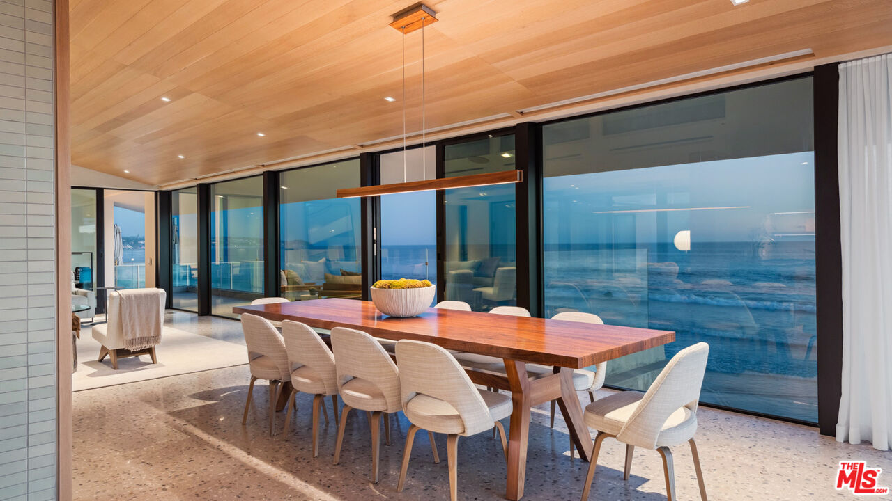 31388 Broad Beach Road Malibu, CA 90265 - Photo 70 of 74 a outdoor space with tables and chairs