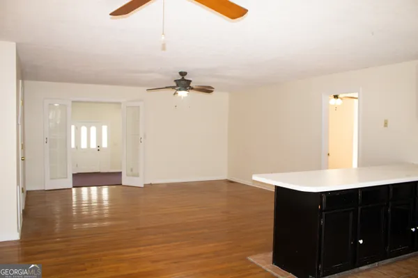 a bathroom with a sink vanity and mirror