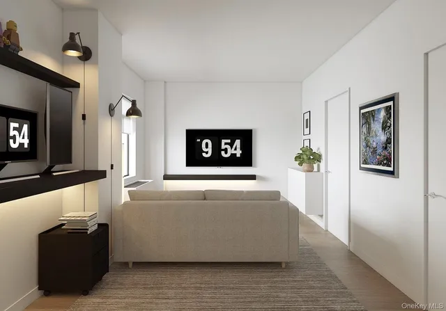 a bathroom with a toilet a sink and a mirror