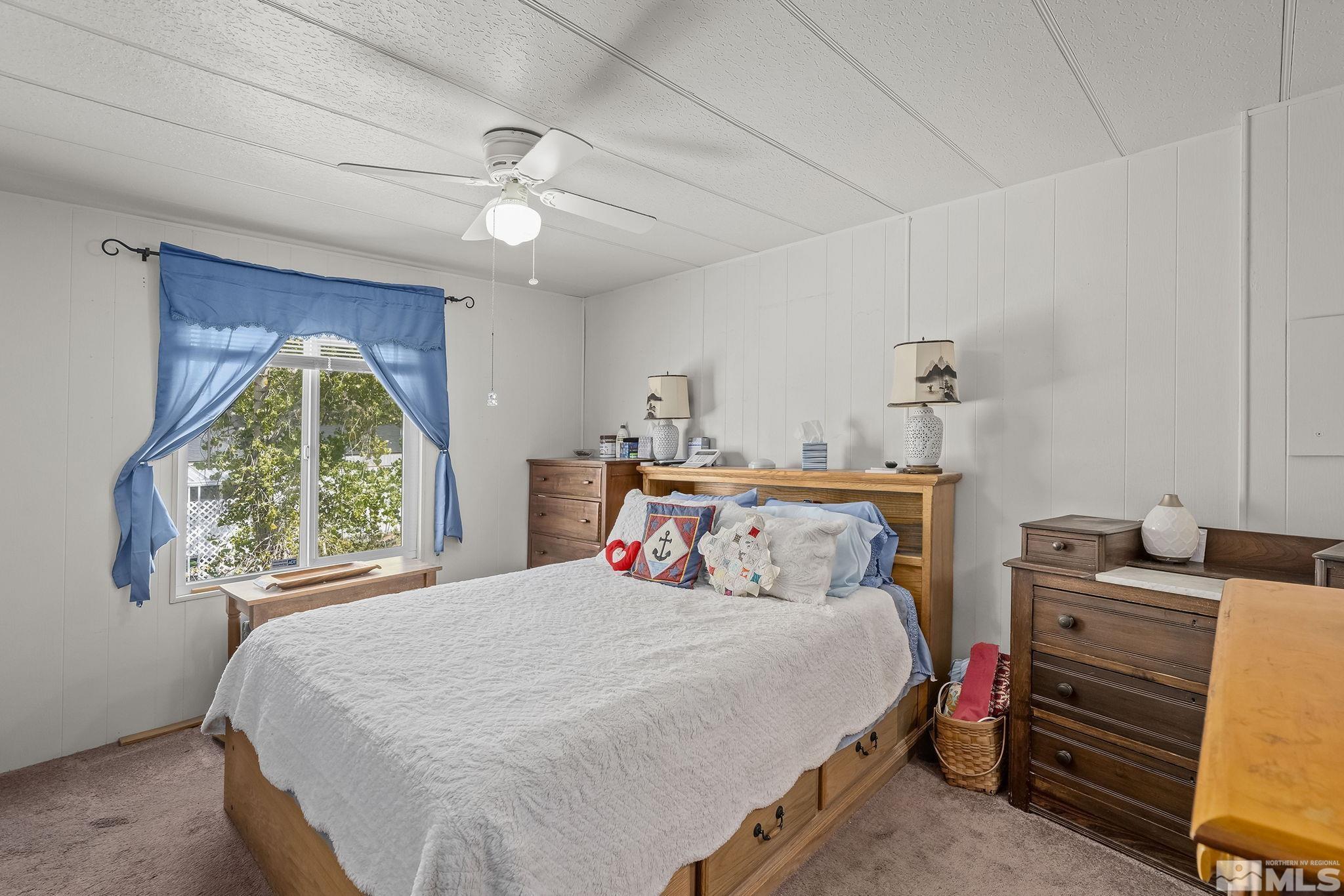 500 Mira Street Reno, NV 89521 - Photo 16 of 31 a bedroom with a bed and a large window