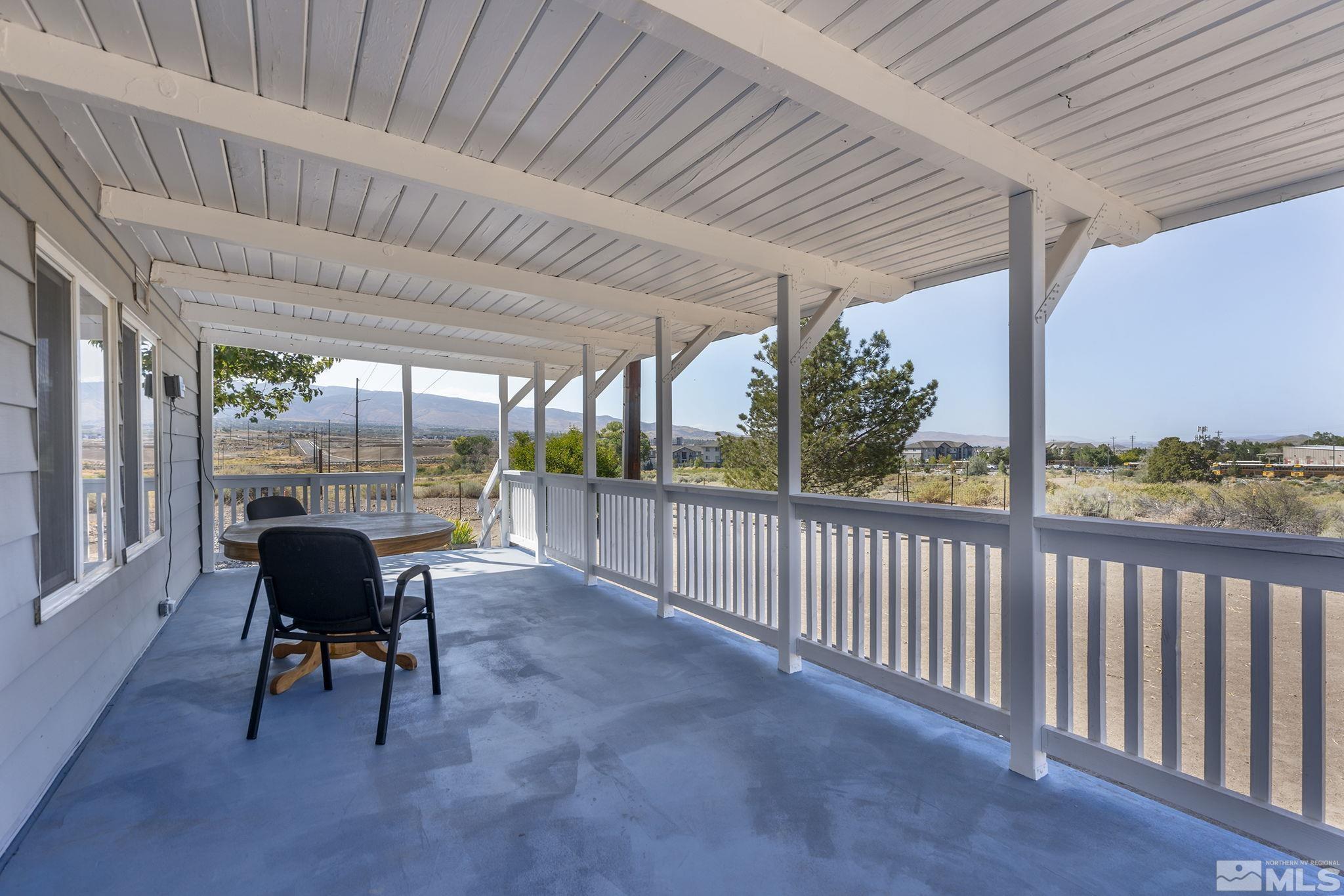 500 Mira Street Reno, NV 89521 - Photo 21 of 31 a view of a porch with furniture and a yard