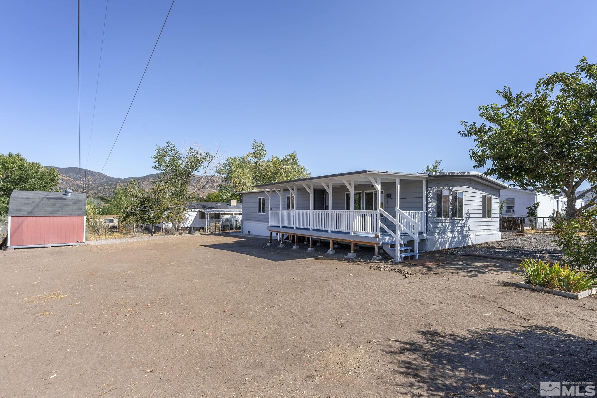 500 Mira Street Reno, NV 89521 - Photo 23 of 31 a view of a house with a yard