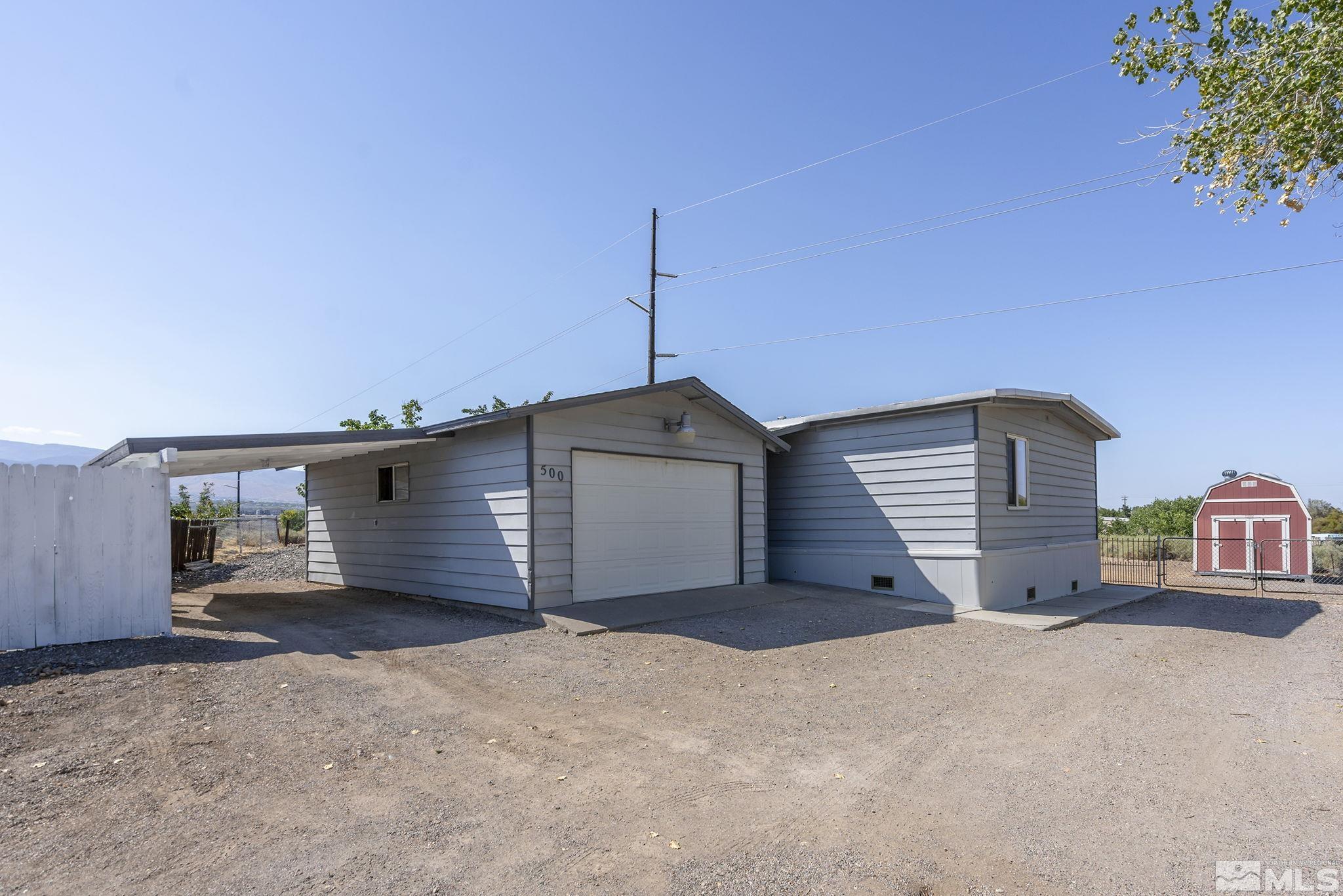 500 Mira Street Reno, NV 89521 - Photo 3 of 31 a view of a house with a garage