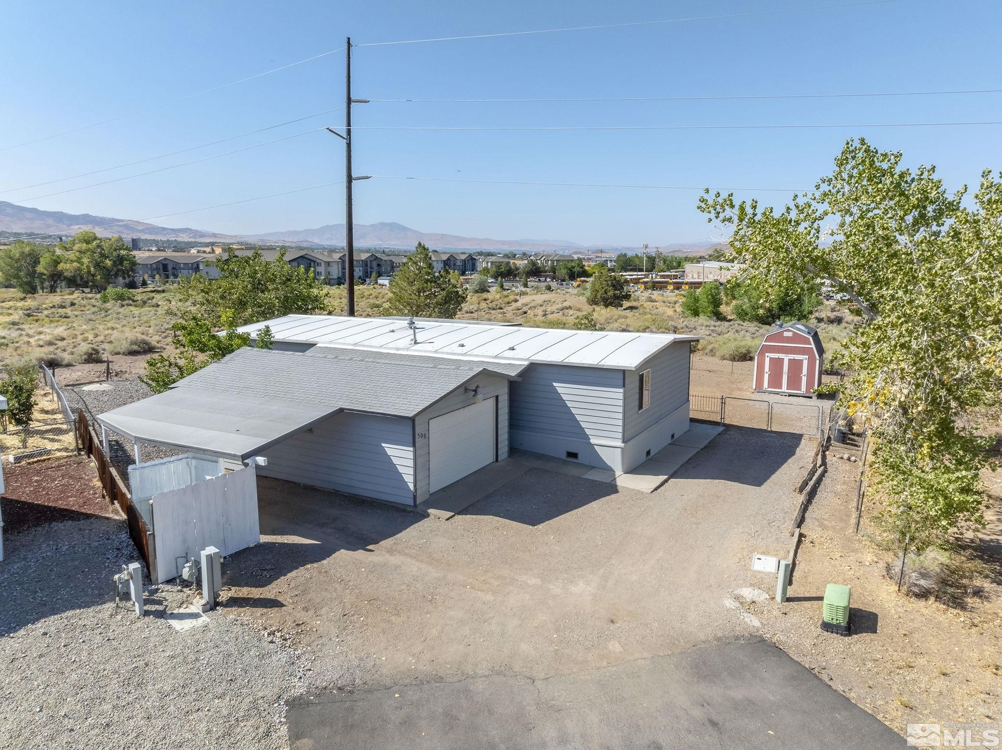 500 Mira Street Reno, NV 89521 - Photo 6 of 31 a terrace with outdoor seating and city view